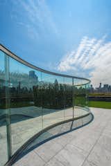 "Hedge Two-Way Mirror Walkabout" by Dan Graham with Günther Vogt. Photo by Hyla Skopitz.  Photo 2 of 5 in A Mirrored Garden Comes to the Met Rooftop