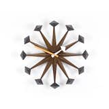 Designed by George Nelson for Vitra, the Polygon Clock is a midcentury classic that will make a stunning focal point in a living room or home office. Crafted in fine walnut, the clock is a standout gift for a design enthusiast.