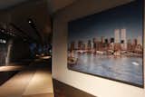 Visitors will pass this photograph of the World Trade Center, taken at 8:30 a.m. on September 11, 2001, as they begin to follow the "ribbon" from the concourse level down to the exhibits at bedrock level. Photo by Jin Lee.