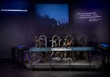 A bicycles tethered to a rack are among the artifacts on display. Photo by Jin Lee.