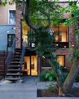 With the help of architects from the Agencie Group, Helen Dealtry and Dan Barry created a home that is suited for a contemporary lifestyle but respects the 150-year history of the Williamsburg residence. Photo by Tara Donne.  Photo 1 of 7 in Modern Brooklyn Row House Renovation by Dora Vanette