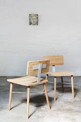 This dowel chair combines simple construction and blonde wood in a nod to twentieth-century Scandinavian design practices that emphasized family, democracy, and ease of construction.  Photo 3 of 5 in Simple Belgian Furniture with a Sustainable Bent