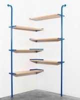 Also by Ateliers J&J, a shelf that fits into corners.