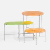 Neon tables by Sebastian Herkner for Haymann, $1,660.

Thin layers of white onyx are placed atop acrylic to achieve an acid-washed look for the steel-legged tables.
