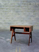 This teak desk is an excellent example of Jeanneret's style, which became broadly popular in India after it was realized in Chandigarh. Photo courtesy of Galerie Downtown.  Photo 4 of 5 in Pierre Jeanneret's Modern Furniture for Chandigarh by Diana Budds