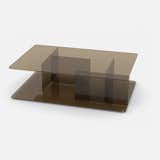 Lucent coffee table by Matthew Hilton for Case. Bronze glass panels joined at right angles create cubbies for storing books and magazines.
