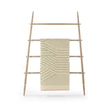 This decorative ladder from MatterMade was inspired by the 19th century ladders used in apple orchards. The ladder can be used on its own, or to display a quilt or throw blanket.