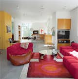 Grunbaum was unafraid of a little color, as his living room (above) proves. It includes a coffee table by Mockett and a Tufty-Time sofa by Patricia Urquiola for B&B Italia.