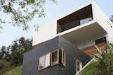 The family home of architect McShane Murnane and his wife Cleo Murnane sits 70 steps up from the street in the Moreno Hills of Silver Lake. The home's clean lines, natural light, and early modernist details amount to a pared down, modern beach house style, 20 miles from the ocean. Photo by Mimi Giboin.