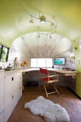 Landscape architect Andreas Stavropoulos&nbsp;transformed a 1959 Airstream that he bought off of Craigslist into a live-in structure situated in the garden of a co-op in North Berkeley, California. With just 150 square feet to work with, Andreas "jettisoned the 1950s colors and wall-to-wall linoleum, and moved in with cork flooring, track lighting, fresh, colorful paint, and custom- designed cabinets and furniture to fit the interior topography," he says.