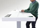 Kinetic Desk by Stir

Already a tech darling, this adjustable height productivity tool could be called the quantified desk. It aims to make the phrase “tied to your desk” a good thing; with Fitbit connectivity, a smooth user interface and a “whisper breath system” that bumps the surface up to encourage more standing, it’s the high-tech solution to the health issues that come from sitting behind a screen all day. CEO and ex-Apple engineer JP Labrosse wanted to create something that invites people to move with subtle engagement and create products that “support people’s best work.” (For more flexible office solutions, read Dwell's June 2014 essay on the changing workplace.)

Photo by Stir  Photo 5 of 10 in 10 Things We Loved at NeoCon 2014