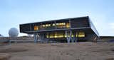 Bharathi Research Station (Antarctica)

Resembling a space station from a vintage ‘60s sci-fi film, this incredible creation by Germany’s BOF Architects inhabits another extreme environment, a coastal hillside on the bottom of the globe. Built to house researchers from India, this structure is easily removable to lessen environmental impact.

Photo by BOF Architects