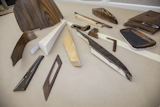 Here's an example of all various wood accents one might see within a car. After the shape is contoured and refined by the designers and woodworkers—the same way as the steering wheel stitch is—it's then ok'd for production.

This is just a glimpse of what goes into three components and similar processes occur for other parts.