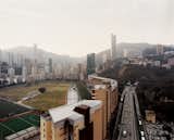 Nestled amidst the high-rises and road-ways of Hong Kong Island’s Causeway Bay 

district, the Happy Valley Racecourse is one of two tracks that see billions of dollars 

wagered each season. Hong Kong’s first official horse race was held on this site in 1846.  Photo 1 of 13 in Hong Kong, China