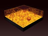 The 2006 Aladdin table, which houses an assemblage of glass pieces within an amber light box.  Photo 5 of 13 in Design Junkie