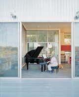 The architects built the house around Madeline’s grand Schimmel piano. But that’s not to say the pair wanted to live in a concert hall. Having a flexible living space and accommodating recital guests took priority.  Photo 5 of 10 in Abiquiu Debut