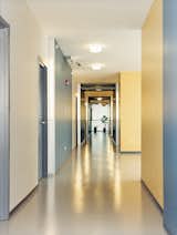 The spacious corridors of the Schiff Residences are clean, well-maintained, and warmly colored—-a convincing hybrid of social housing and home.