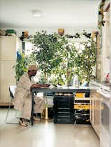 Resident Ernest Gladney speaks with a friend in the Schiff’s lobby area. Site of many a domino match, the tastefully decorated room helps to personalize the Schiff.  Photo 7 of 8 in Inside Chicago’s Helmut Jahn–Designed Supportive Housing Development