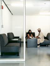 Resident Ernest Gladney speaks with a friend in the Schiff’s lobby area. Site of many a domino match, the tastefully decorated room helps to personalize the Schiff.  Photo 5 of 8 in Inside Chicago’s Helmut Jahn–Designed Supportive Housing Development