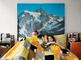 Alexandra and Barlow enjoy a leisurely Alpine morning in bed underneath a quilt by Cranbrook Academy of Art graduate Abigail Newbold.