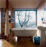 In the master bathroom upstairs, the Tokyo roll-top bathtub from victoriaplumb benefits from an epic view.