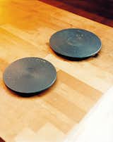 A pair of hot plates await dishes in the dining nook.