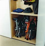 The storage of the bicycles and cycling gear was a major factor in the design of the cupboard space. The floor is plain and simple to clean, which is essential for those wet winter days when they return home from work with muddy wheels and dripping clothing.