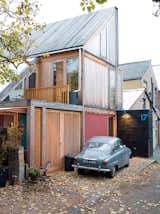 Marcus Lee and Rachel Hart’s wonderful wooden home sits at the end of a quiet London lane and politely turns its back on the workshops next door.