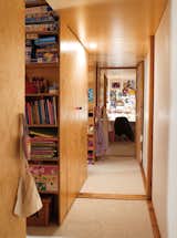 On the top floor the children have a sequence of bedrooms built into the eaves with space enough for desks and a choice of standard bed or bunk bed.  Photo 6 of 8 in Slanted and Enchanted