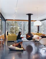 Michael Johnson’s answer to having little buildable land to work with in his design of Ruth Hiller’s Winter Park, Colorado, house was to elevate and cantilever the kitchen, living, and dining space over the carport, nearly doubling the home’s living area. To avoid a space-hogging fireplace, Johnson recommended a Bathyscafocus by Focus Creations. Hiller took the suggestion and now enjoys the warmth of a fireplace and the full square footage of her living room.