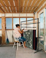 Rosie Joe weaves a traditional Navajo rug.