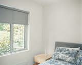 The guest room is furnished with pieces by neighbor and designer Niels Bendtsen.