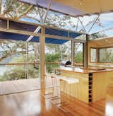 The kitchen has a view to the Hawkesbury River.  Photo 3 of 4 in Outback Staked House