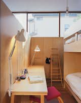 The boys’ bedroom is compact while providing room for sleep as well as study.