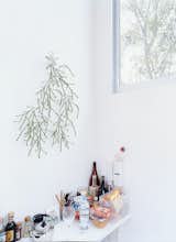 In Unit J's kitchen, the Bouroullec brother's Algue for Vitra echoes the greenery outside.  Photo 8 of 10 in Building Blocks by Maggie Kinser Hohle