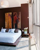 The bedroom. The addition of the couple’s art collection "has really given [the color] purpose," says Julie Gibson.