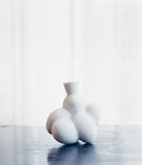 An Egg vase.  Search “modern-furniture-from-egg-collective.html” from Marcel Wanders