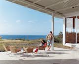 Outdoor, Large Patio, Porch, Deck, and Concrete Patio, Porch, Deck Architect Craig Steely designed this house for himself, his wife Cathy Liu, a painter, and their son, Zane, that looks out to the Pacific Ocean from a lava flow on the big island of Hawaii.  Photos from Go With the Flow