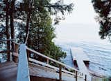 A wooden stair leads from the house down to a dramatic view of Lake Superior.  Photo 5 of 10 in Off the Beaten Path