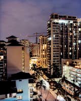 A crane-dotted night sky over Waikiki’s condos and hotels attests to the city’s recent building boom, as developers rush to accommodate the area’s teeming 4.5 million visitors per year.  Photo 5 of 16 in Honolulu, Hawaii