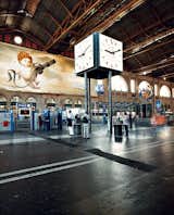 Precision timekeeping, a central design element at the main station, governs the trains.