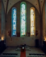 Stained-glass windows by Marc Chagall illuminate the choir at Fraumünster Church.  Photo 13 of 55 in WINDOWS by Jani Cowan from Zurich, Switzerland
