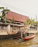 Traditional Thai homes can be spotted from the river and are best seen from one of Bangkok’s many canal tours.