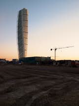 The proverbial ivory tower of urban regeneration, Santiago Calatrava’s Turning Torso stands proud amid the rubble of redevelopment.  Photo 1 of 7 in Malmö's Metamorphosis