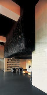 A dark cloak of Jongstra’s felt covers the ceiling and walls of a private residence in Amersfoort.