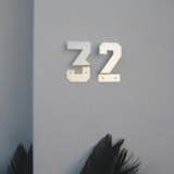 Numbers 

By Andrew Byrom 

$30 each, 6.5" H x 3.75" W, anodized aluminum  Search “house numbers” from Modern House Numbers