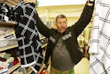 Hollywood, CA - December 04, 2008:

Designer Philippe Starck shops with his wife Jasmine Starck and daughter Ara at a Big Lots store in Hollywood. Philippe Starck is a designer of iconic furniture, products and interiors.

(Al Seib  / Los Angeles Times)