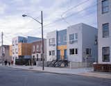 The homes were built for $108 per square foot using cedar paneling and corrugated aluminum arranged horizontally to correspond with the vinyl siding of neighboring homes.  Photo 4 of 6 in Brooklyn Renaissance