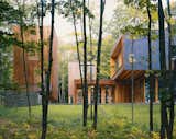 The ever-changing, lush wooded surroundings of Minnesota, such as those experienced at this 8,000-square-foot Type Variant House outside of Minneapolis designed by Coen and Partners, are right near the small town of New Richland. 