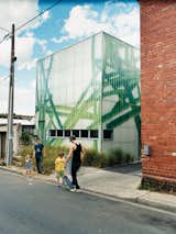 The building is a funky landmark in a drab industrial laneway.
